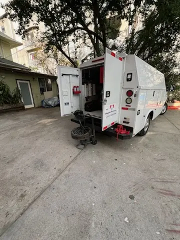 Magnet Plumbing service vehicle on-site for Sewer Line Repair in Meyerland Area